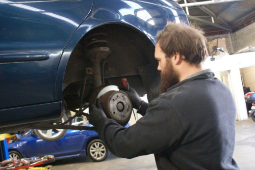 Reid Auto &amp;amp;amp;amp;amp;amp;amp;amp;amp;amp;amp;amp;amp;amp;amp;amp;amp;amp;amp; Electrix team member working on brakes